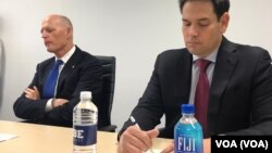 Los senadores de la Florida Rick Scott y Marco Rubio, de izquierda a derecha. (Foto de la VOA).